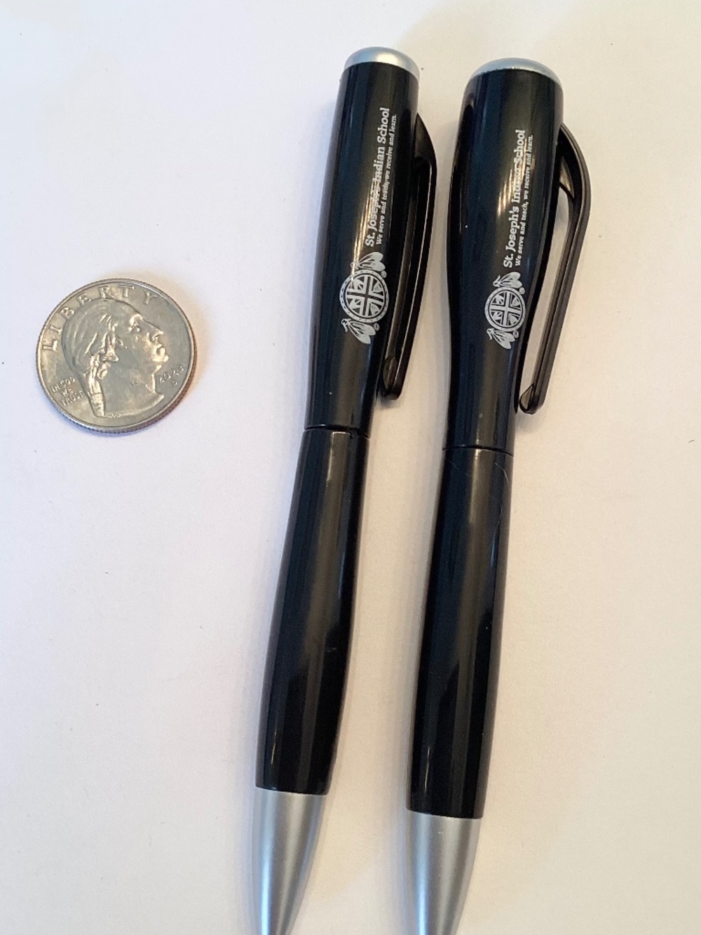 TWO FLASHLITE PENS!  Smooth writing black ink.